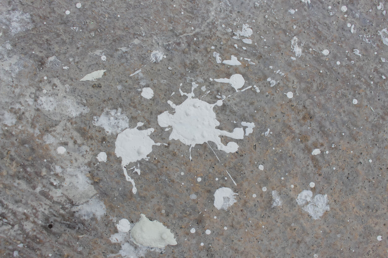 Paint stains scattered on the floor.