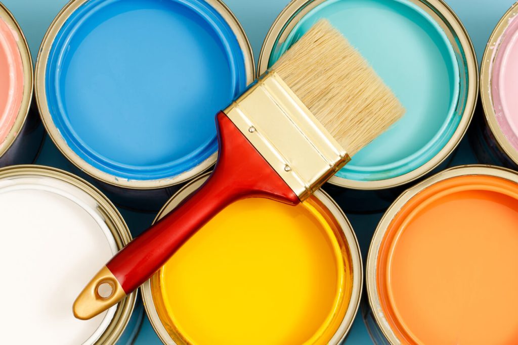 Paint cans and paint brushes and how to choose the perfect interior paint color